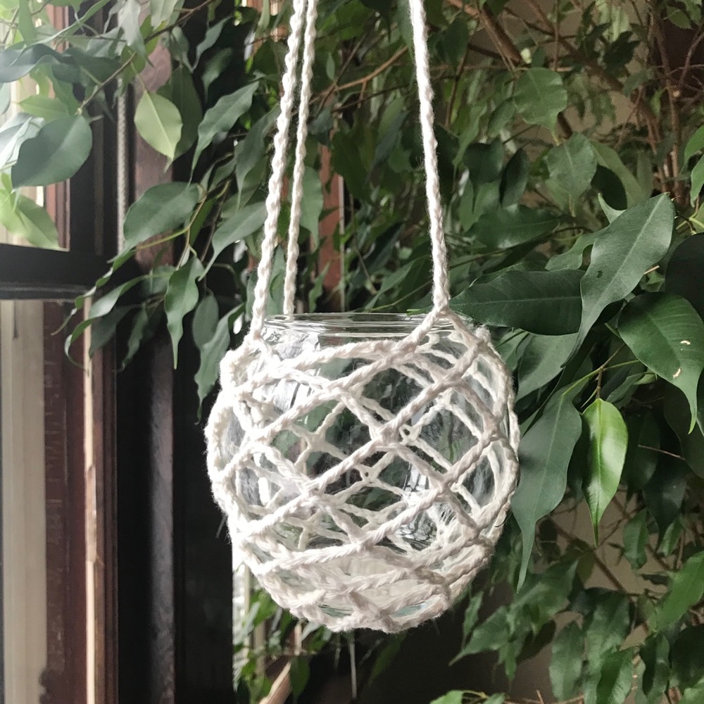 Crocheted hanging glass bowl